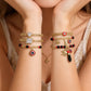 Bohemian Evil Eye Bracelet – Elephant & Hamsa Charms, Gold-Tone, Adjustable ✨